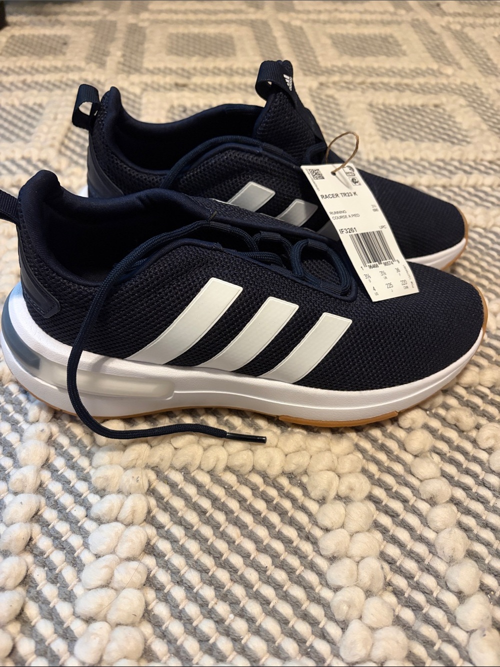 adidas boy’s Navy Sneakers with White Stripes